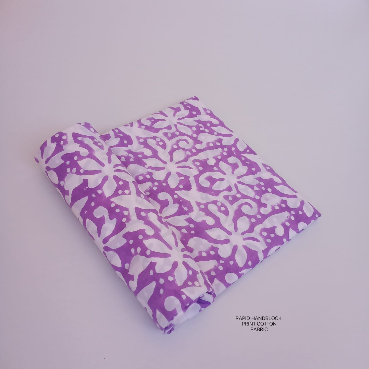 Jaipur Sanganeri handblock printed cotton fabric wholesale in white purple jaal pattern